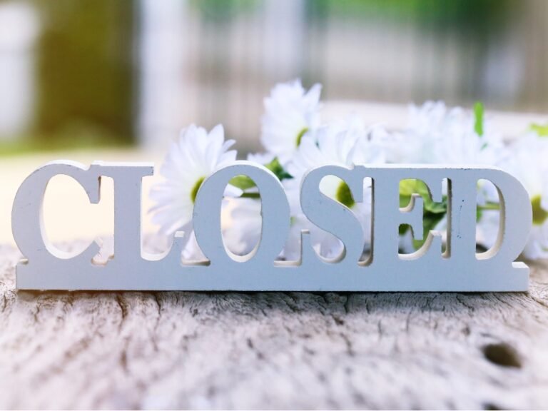 Sign indicating Lights of Love Events Place will be closed in observance of Eid al-Fitr.