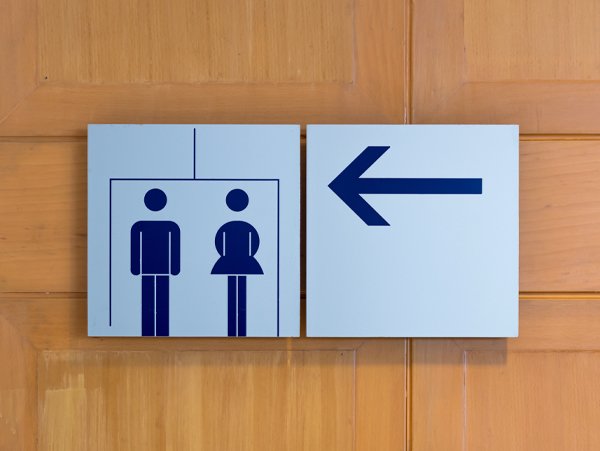 A restroom sign at an event venue in Metro Manila, helping guests easily locate the restroom facilities.